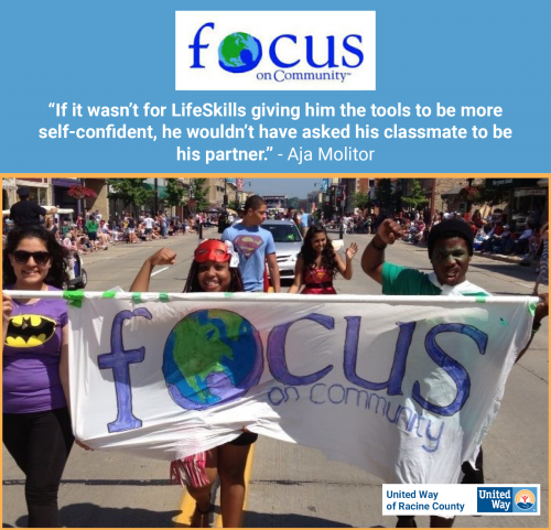 [ID: Three people march a “Focus on Community” banner through a parade. A quote from Aja Molitor says, “If it wasn’t for LifeSkills giving him the tools to be more self-confident, he wouldn’t have asked his classmate to be his partner.”]