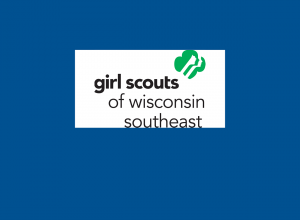The Girl Scouts logo on a blue background.