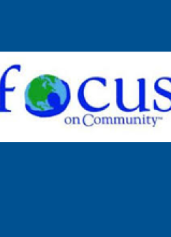 The Focus on Community logo on a dark blue background.